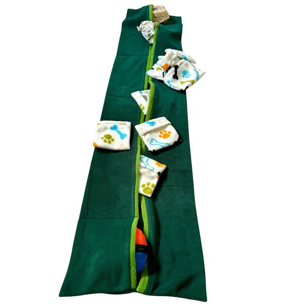 Bottle green Snuffle Pocket Explorer dog enrichment mat with 12 pockets filled with enrichment toys and activities.